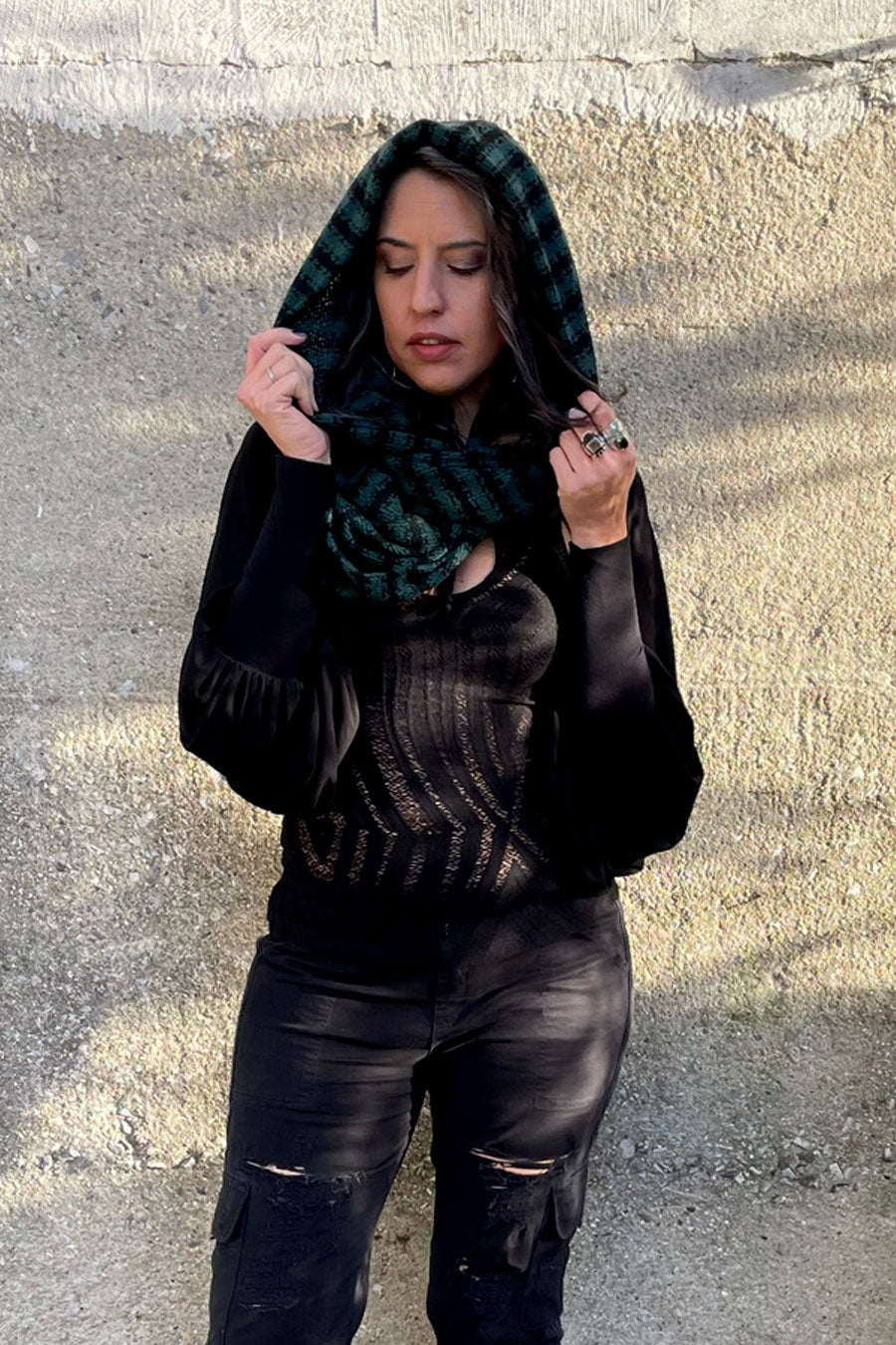 woman wearing and holding Snuggle Weather Hunter Green & Black Hooded Infinity Scarf AKA the Empire
